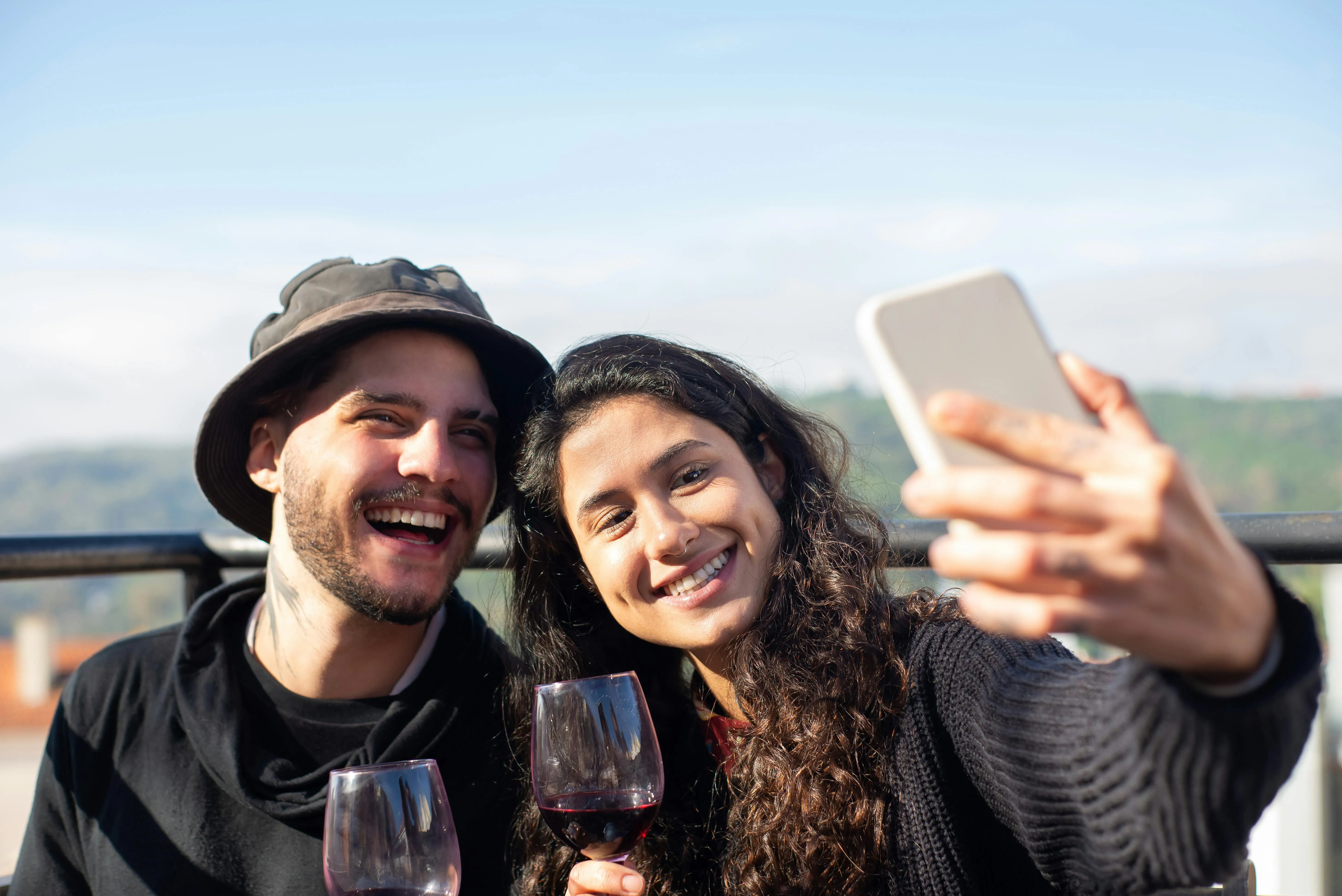 Visitors enjoying a drink with a view during their stay in Romania